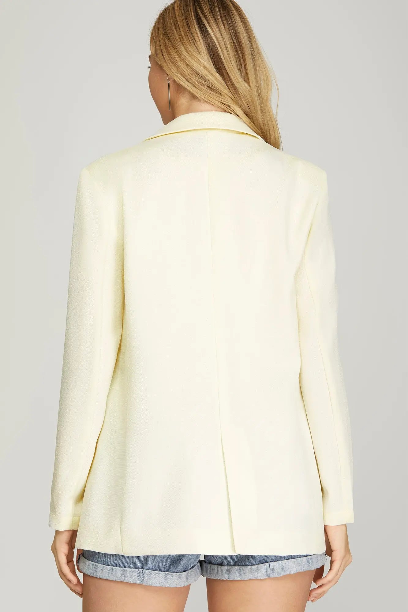 Cream single breasted blazer with front pockets